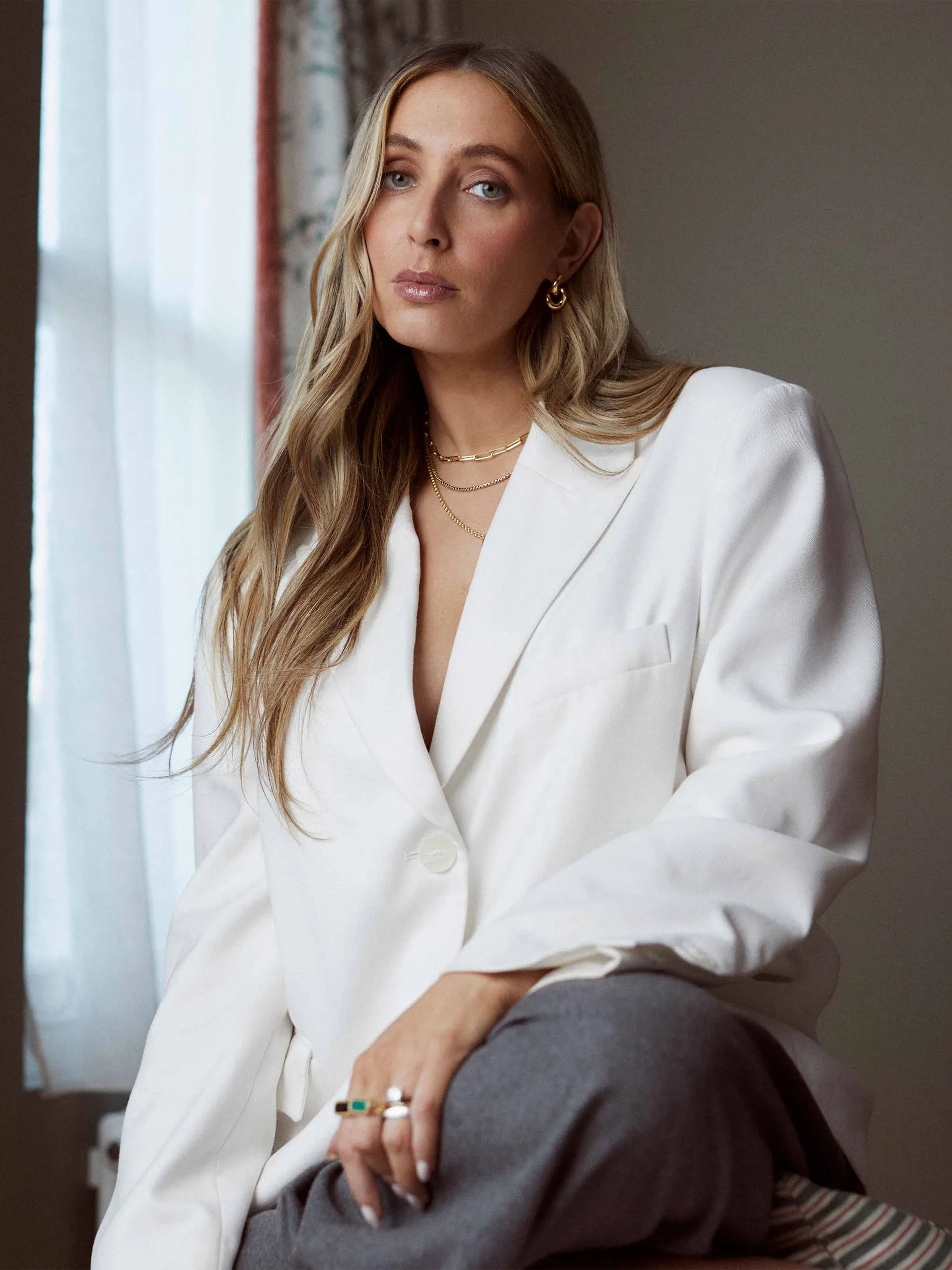Charlotte Collins twist hoop earrings in gold