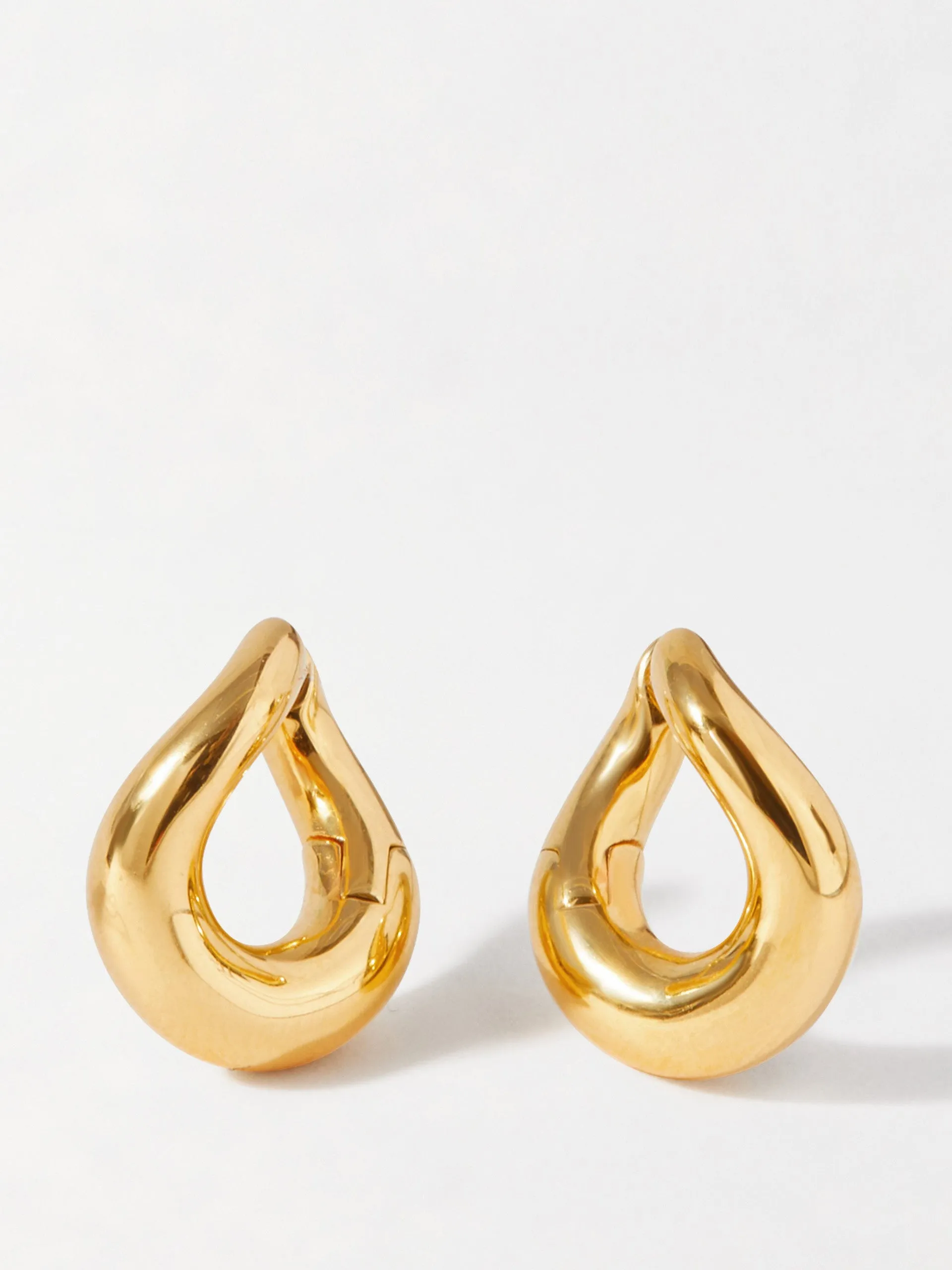 Charlotte Collins twist hoop earrings in gold