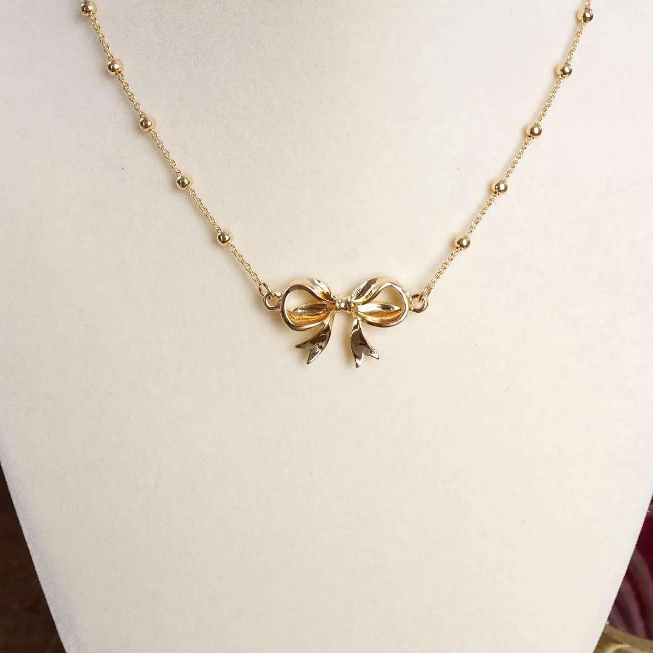 Fancy Bow Necklace - Short Dainty Station Chain in Gold Tone