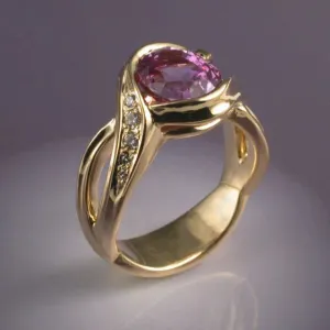 Gold Ring Featuring Garnet Crystal and Zirconia Accents